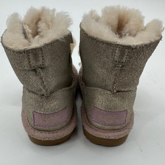 UGG Infant Girls Metallic Gold Sheepskin Bow Booties With Pom-Poms - Picture 8 of 11